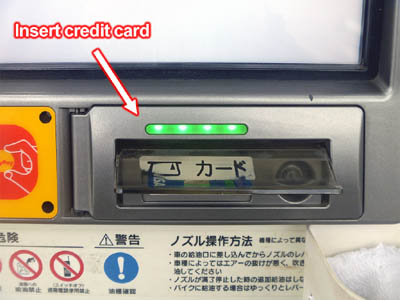 Credit card slot and lit green LED