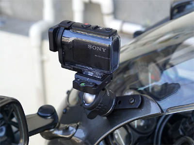 HDR-AS50 action camera (video camera) made by SONY attached to the cowl of a motorcycle