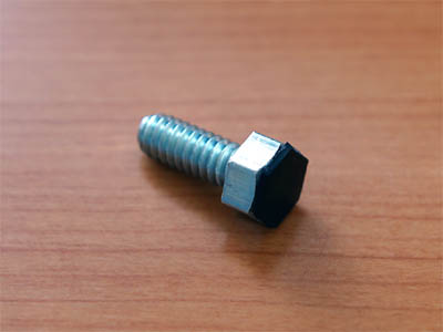 1/4 inch bolt with protective rubber plate attached