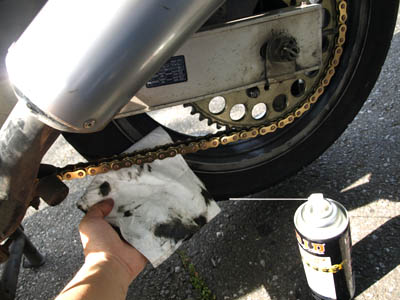 Spray the lube on the bike chain